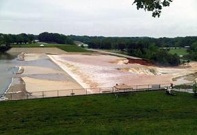 Water Over Spillway; T Highway Cut In Two