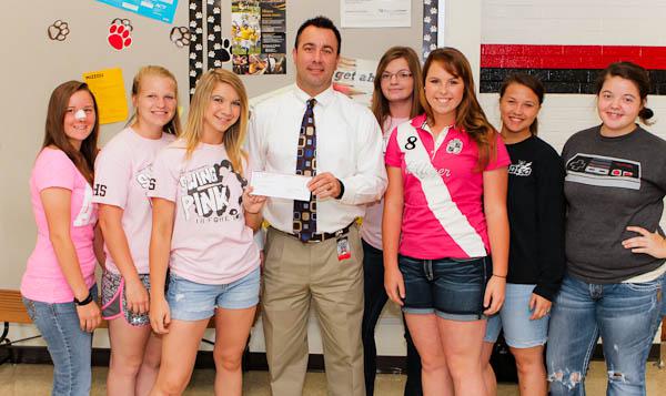 Softball 'Cats Present Earnings To 18 FORE Life