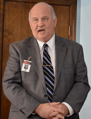 Dr. Sharp Speaks at Rotarian Luncheon Meeting