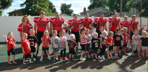 DHS Football Players Surprise Small Wonders Children