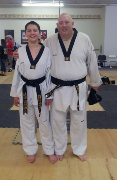 Father and Son Earn Their Black Belt Together