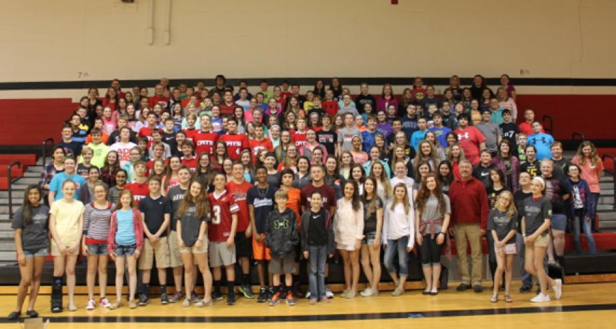 Robert Shell Drops by Dexter Middle School With Gifts