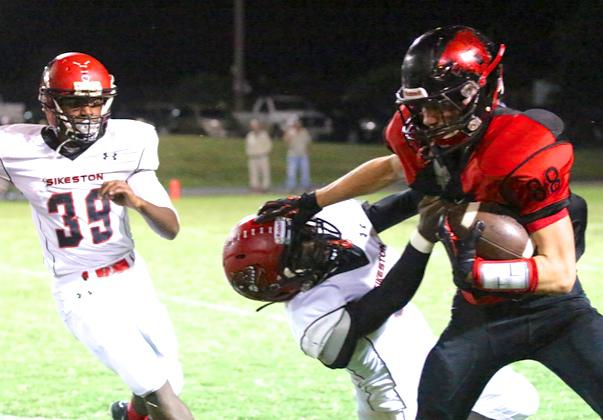 Dexter Bearcats Fall Hard to Sikeston Bulldogs