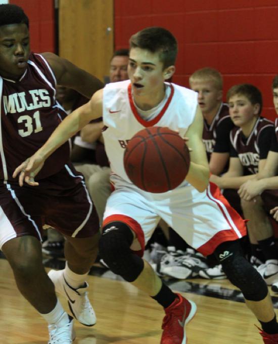 DMS 8th Grade Boys Basketball Team Defeats Poplar Bluff