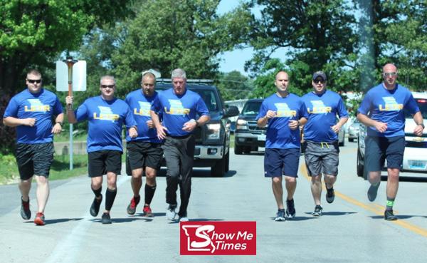 Local Law Enforcement Carries Torch for Special Olympics