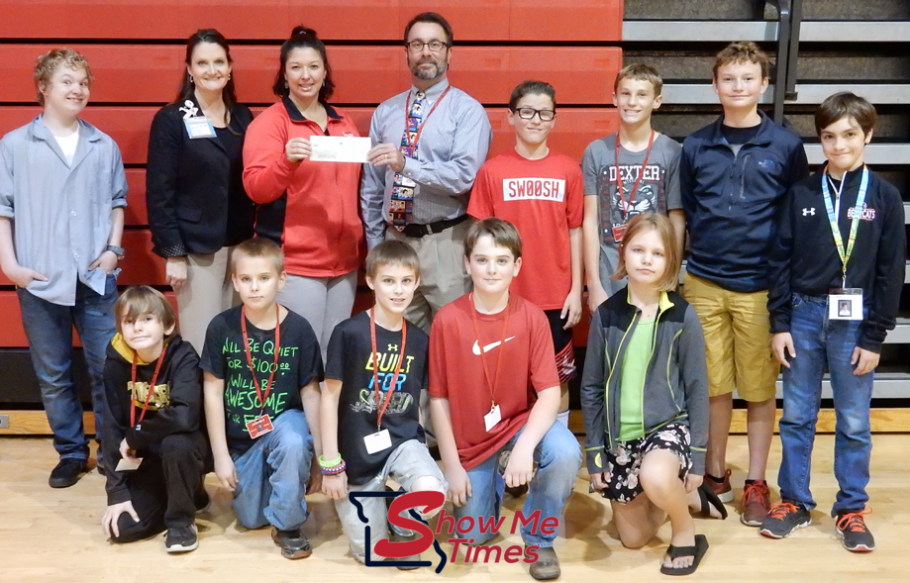 Fall Community Tailgate Committee Donates to T.S. Hill Middle School