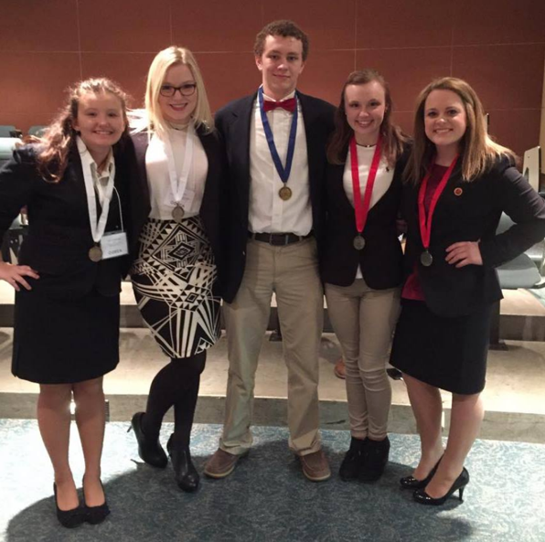 DHS DECA Members Excel At District Competition