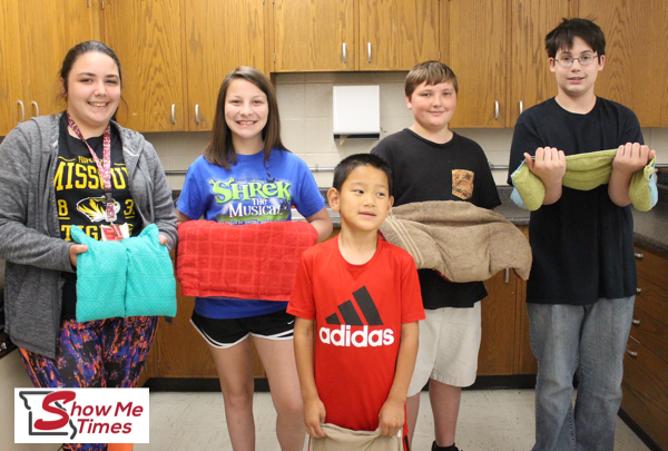 DMS Students Make Blankets for Autism Students