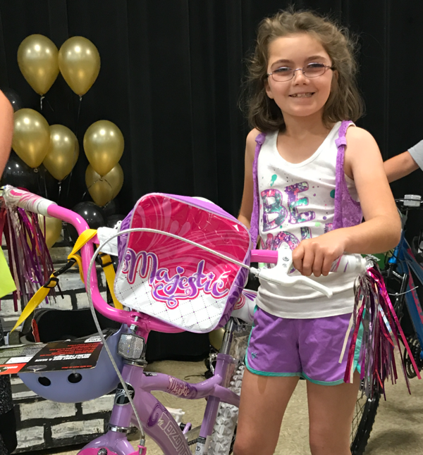 Fifth Grade Risco Student Receives Bicycle from Bernie Masonic Lodge