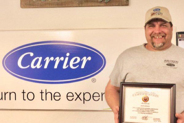 Jason Johnson, owner of Air-Tech Heating and Air LLC, receives NATE Certification.