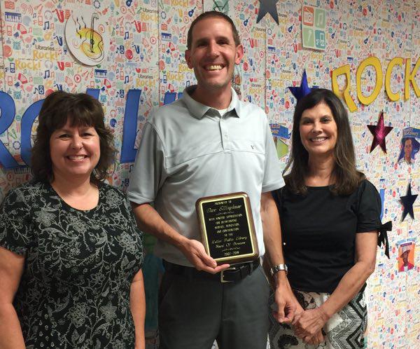Dave Ellinghouse Recognized for His Tenure on Keller Library Board