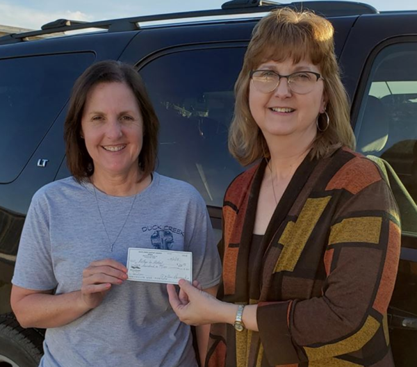 Duck Creek Baptist WINGS Makes Donation to Mother-to-Mother Program