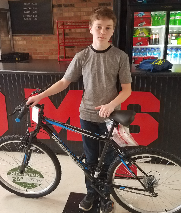 Student Receives Bike from Masonic Lodge