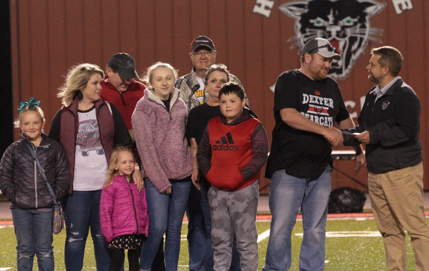 Fiddler's Fish House Family Honored at DHS Football Halftime