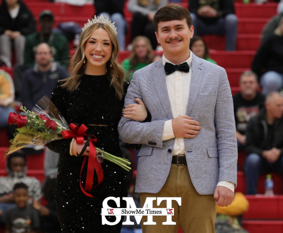 Retiring 2023 DHS Winter Homecoming Queen, Callie Whitaker, Escorted by Cole Gibson.